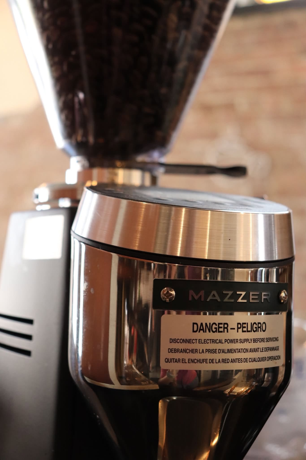 Mazzer coffee grinder with beans in the hopper
